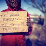 bigstock-a-homeless-person-with-a-sign-43013299.jpg